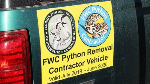 A sign on the back of Kalil’s SUV