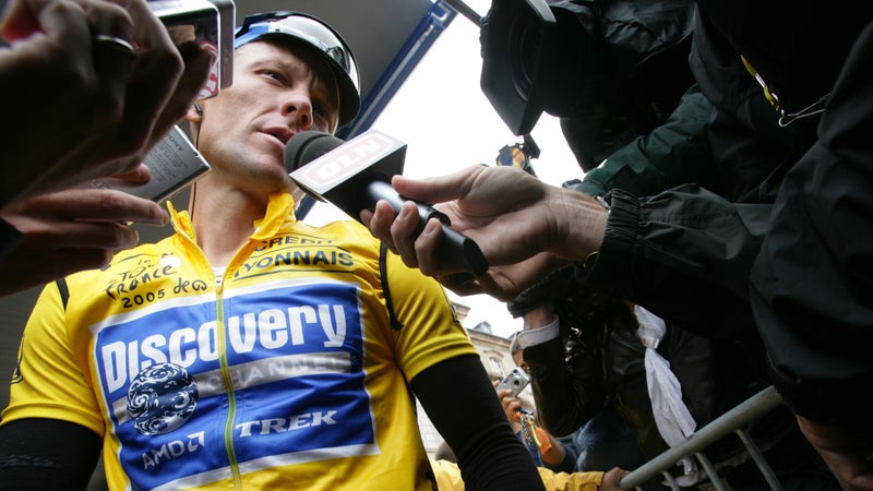 Armstrong talking to media during the 2015 Tour de France