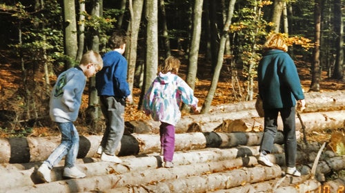 Martin Fritz Huber (left) as a seven-year-old, walking with friends during a volksmarch in Germany.