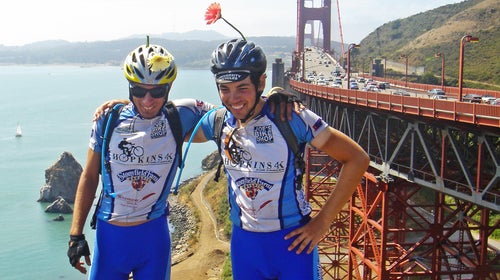 The author (left) and his teammate Ersin pose next to the Golden Gate Bridge before crossing into San Francisco