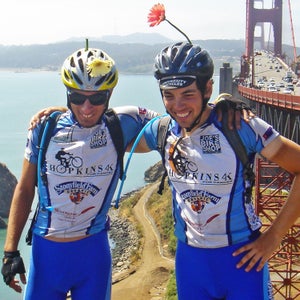 The author (left) and his teammate Ersin pose next to the Golden Gate Bridge before crossing into San Francisco