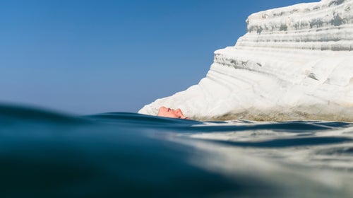 Woman Relaxing In The Ocean
