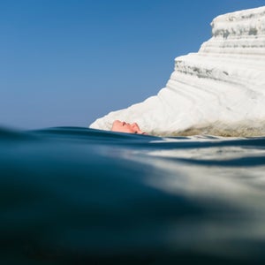 Woman Relaxing In The Ocean