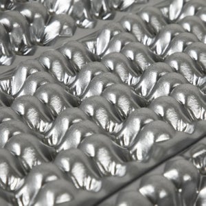 The bumps and divots on closed cell foam pads cut weight, and may allow sleeping bag insulation to retain some loft, even when it's underneath you.