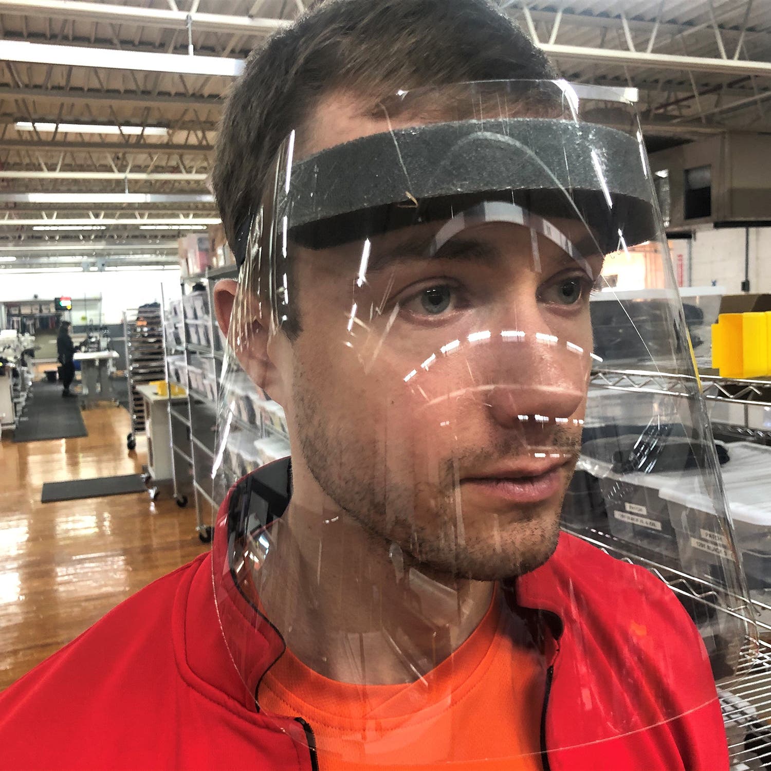 man wearing a face shield