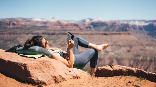 Outdoors Woman Reading A Book