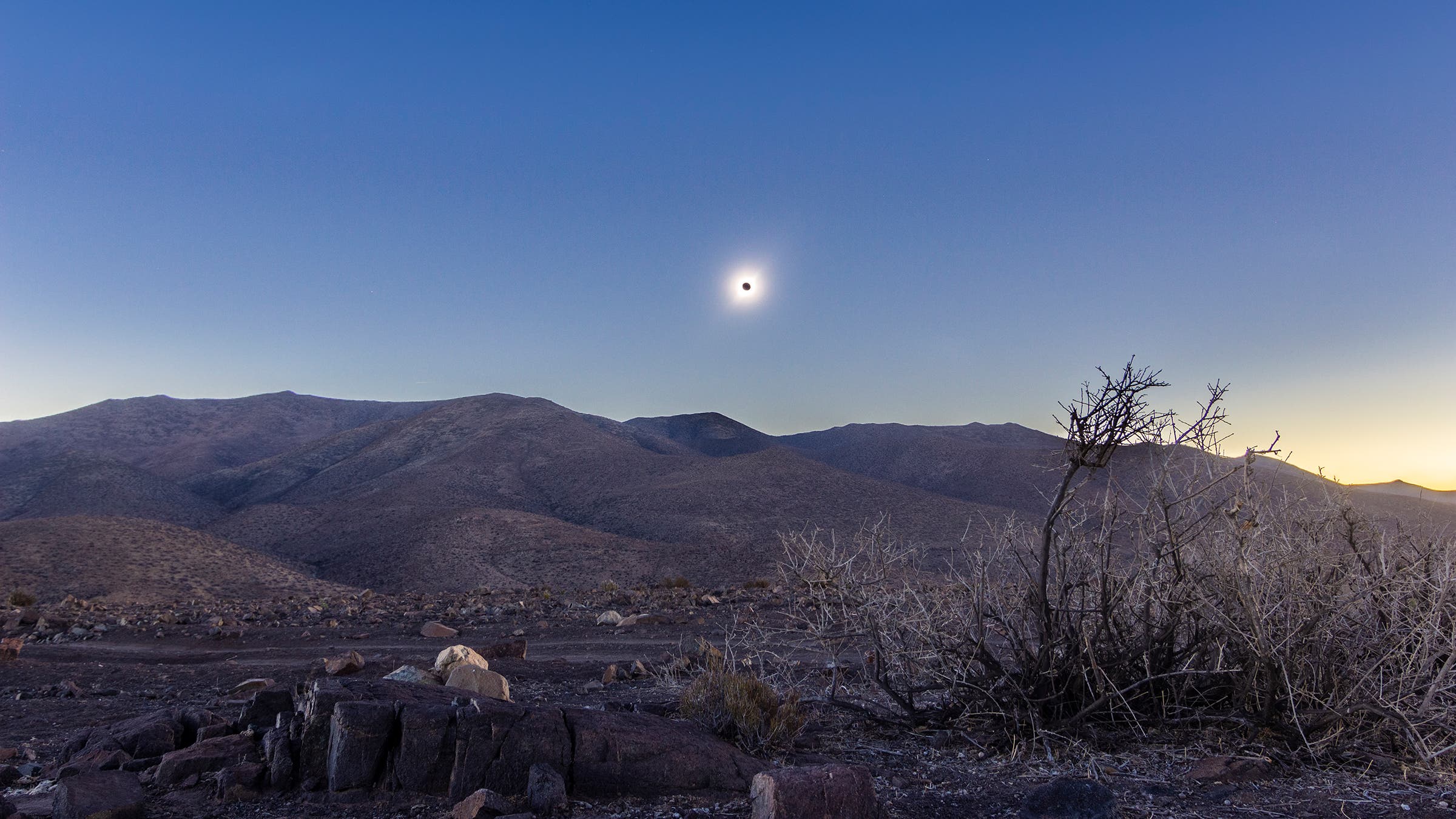Total Solar Eclipse at Atacama Desert 2 July 2019, an amazing event to see. All the Solar Eclipse phases in one shot with a view of the totality and the Sun Corona on an awe arid landscape desert view