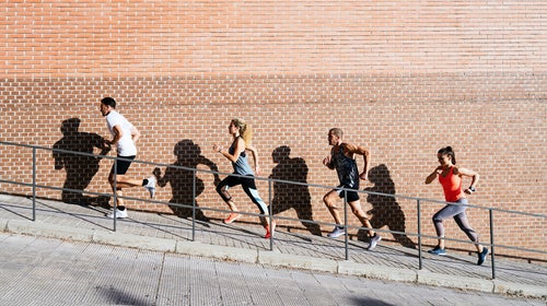 Athletes Running In The Street