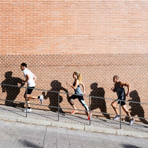 Athletes Running In The Street