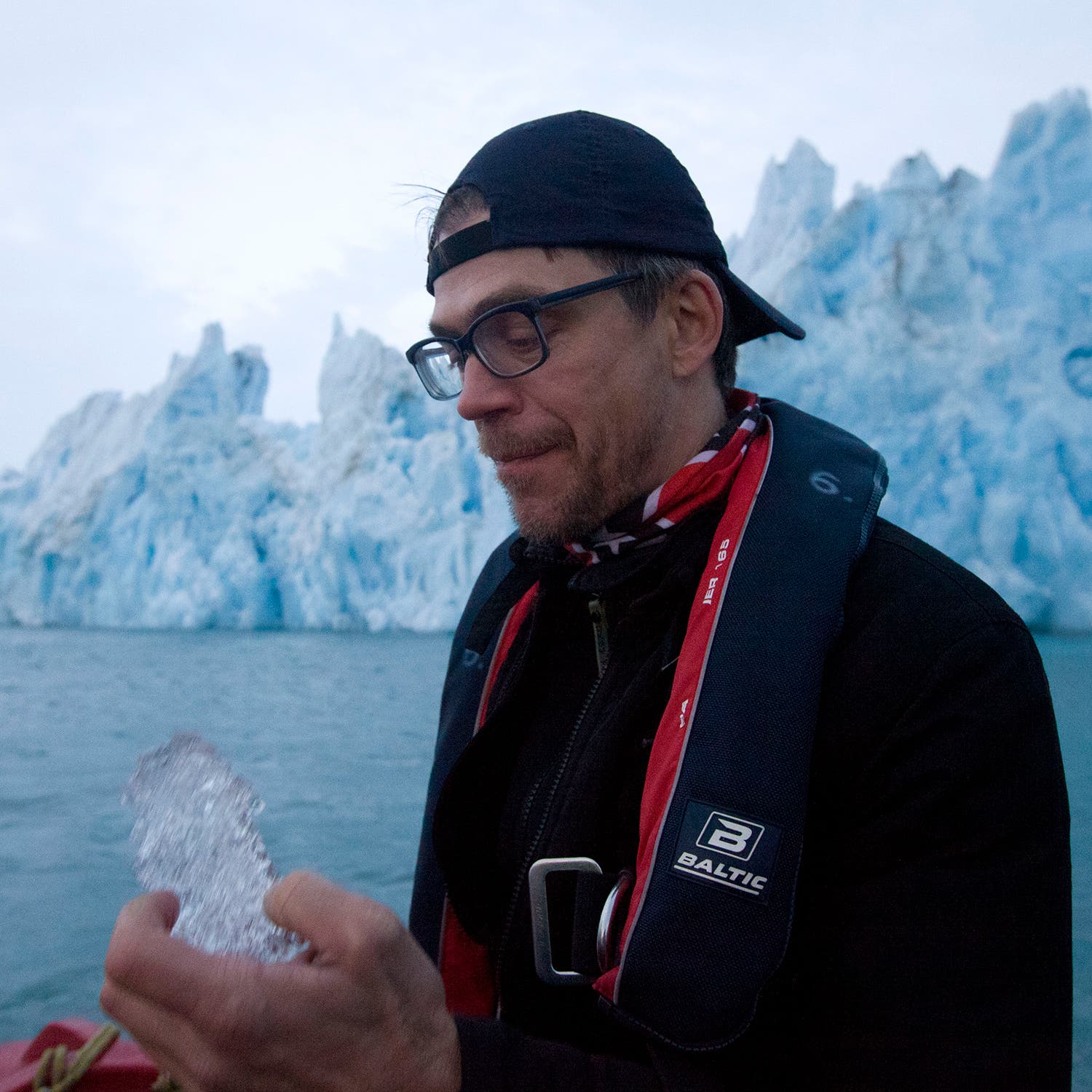Alexey Neumoin ponders ice from the Chaev Glacier.