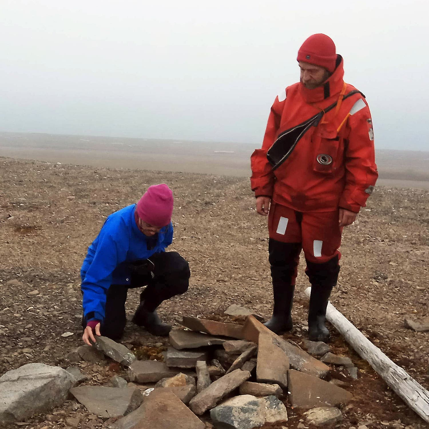 The author and Andrey Ianushkevich look for grave sites on Novaya Zemlya.