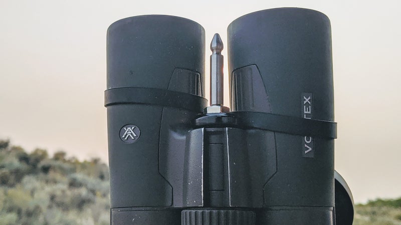 The QD pin (pictured here in bare metal) simply threads into the standard quarter-inch socket that’s found on most binoculars.