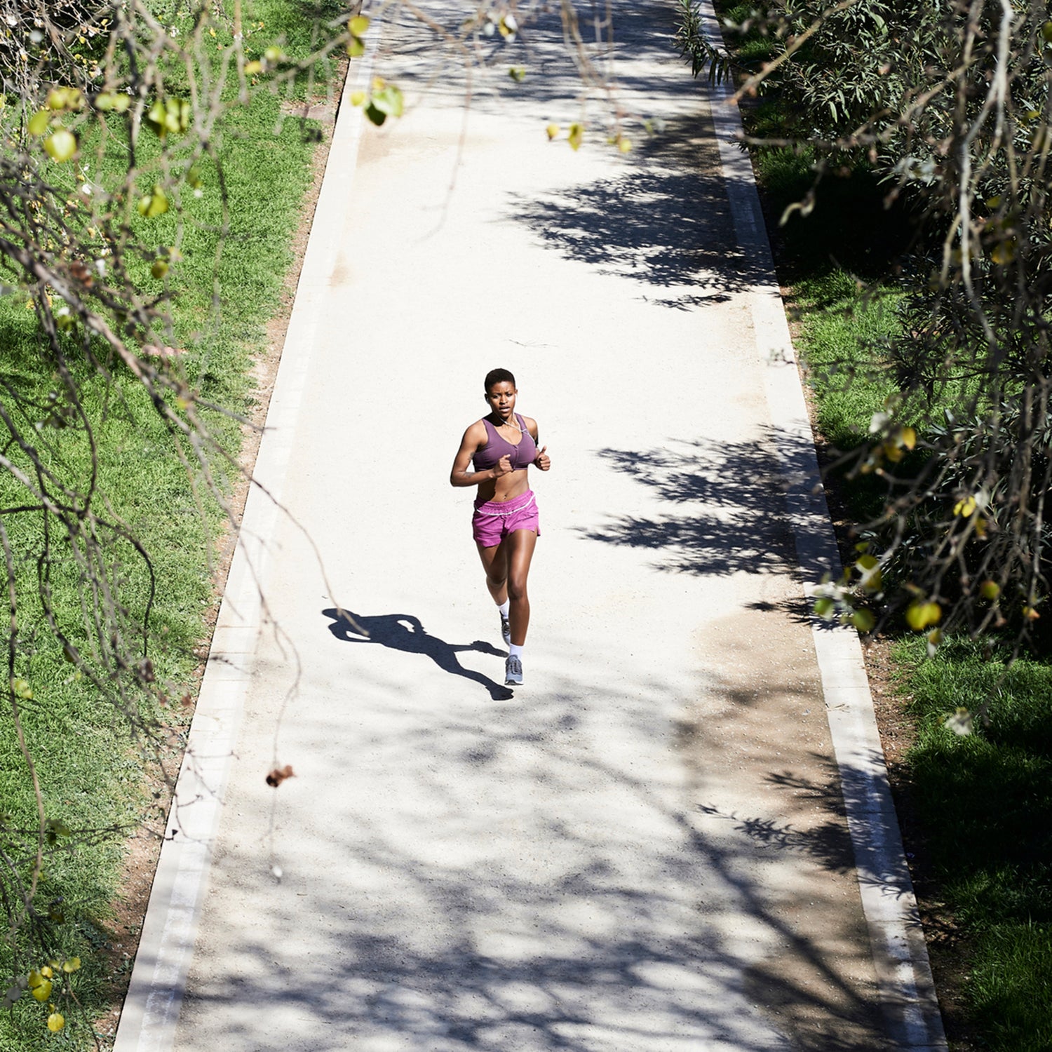 Premium Photo  Woman fitness and runner at stadium track for