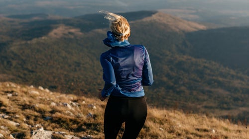 Woman Runner In Nature