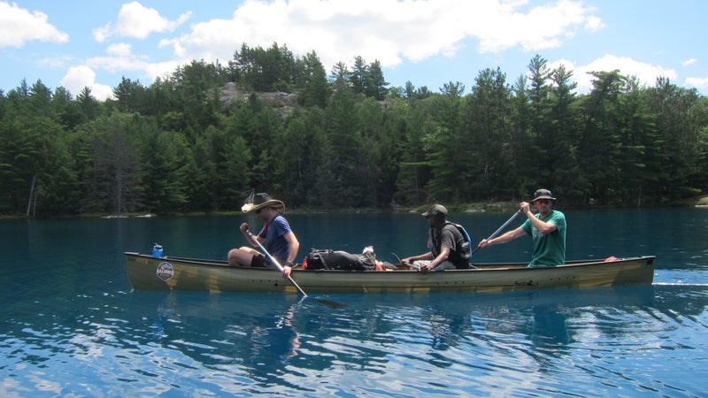 An 18.5-foot canoe easily holds three adults and their gear. This is the Swift Keewaydin 18.6.