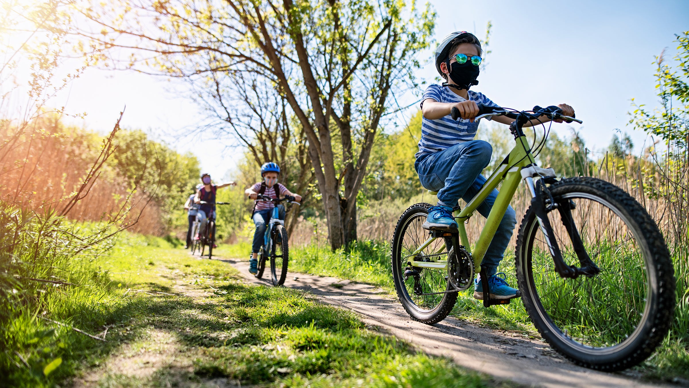 Family enjoying a bike trip during COVID-19 pandemic