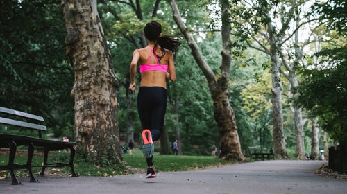 Young Woman During Jogging In Central Park, Ny
