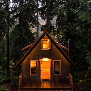 It sounds like a fantasy: join forces with a good friend to build a sweet little cabin in the woods.