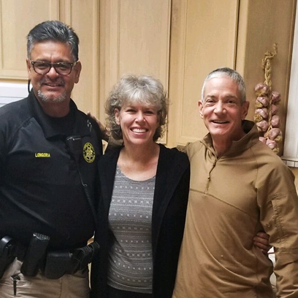 Kathryn and Doug Houston in their home with former Stanislaus County Sheriff’s Department sergeant Hector Longoria