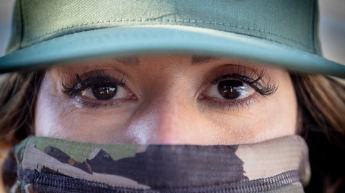 Camo and lashes, Rihana attempts to blend into her surroundings.