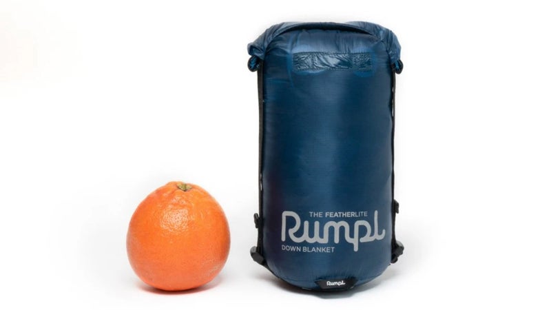 Rumpl’s new Featherlite blanket packs down small enough to fit in a purse or a backpack with ease yet offers appreciable, versatile weather protection.