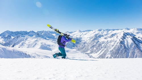 Woman during backcountry skiing day in the Pyrenees mountains Catalonia Spain