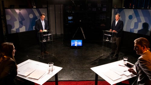 Montana governor Steve Bullock, back left, and Senator Daines, back right, prepare for their televised debate on September 28, 2020