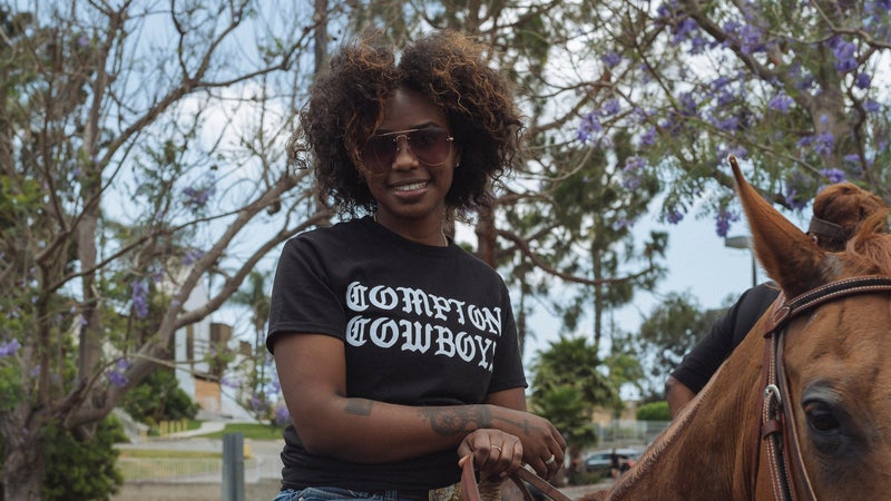 Keiara Wade participates in the Compton Cowboys Peace Ride, organized as a show of solidarity for the black community in Los Angeles and Compton, Calif., June 7, 2020.  (Kayla Reefer/The New York Times)