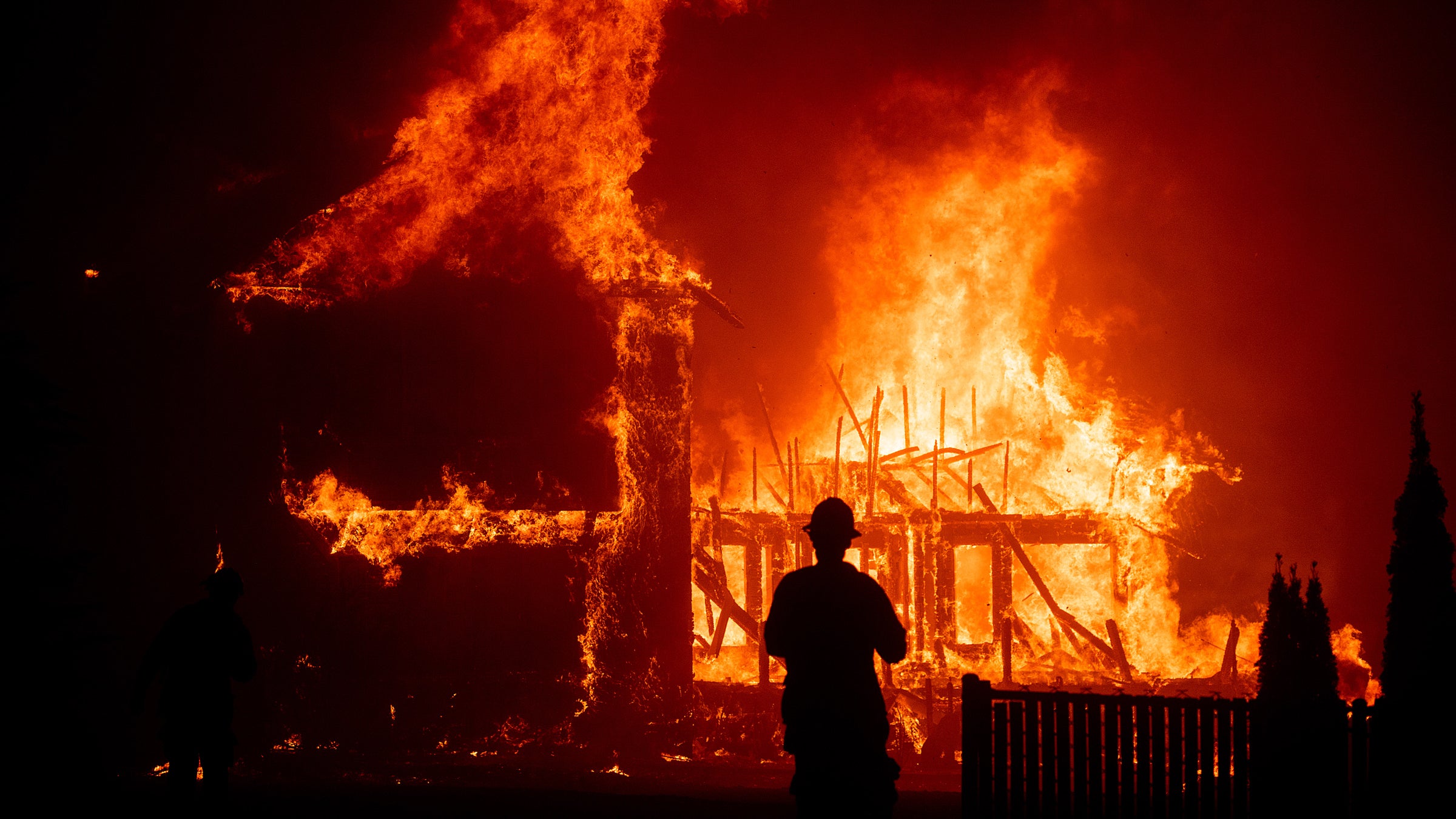 A home burning during the November 2018 Camp Fire in Paradise, California