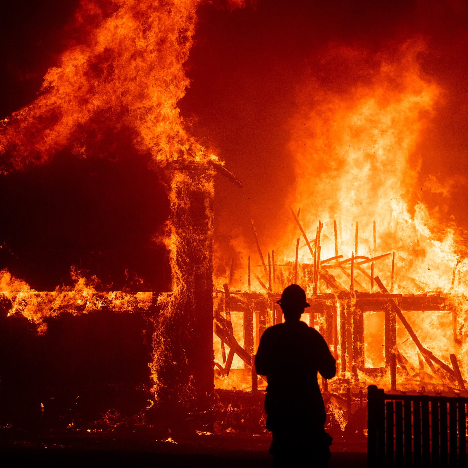 A home burning during the November 2018 Camp Fire in Paradise, California