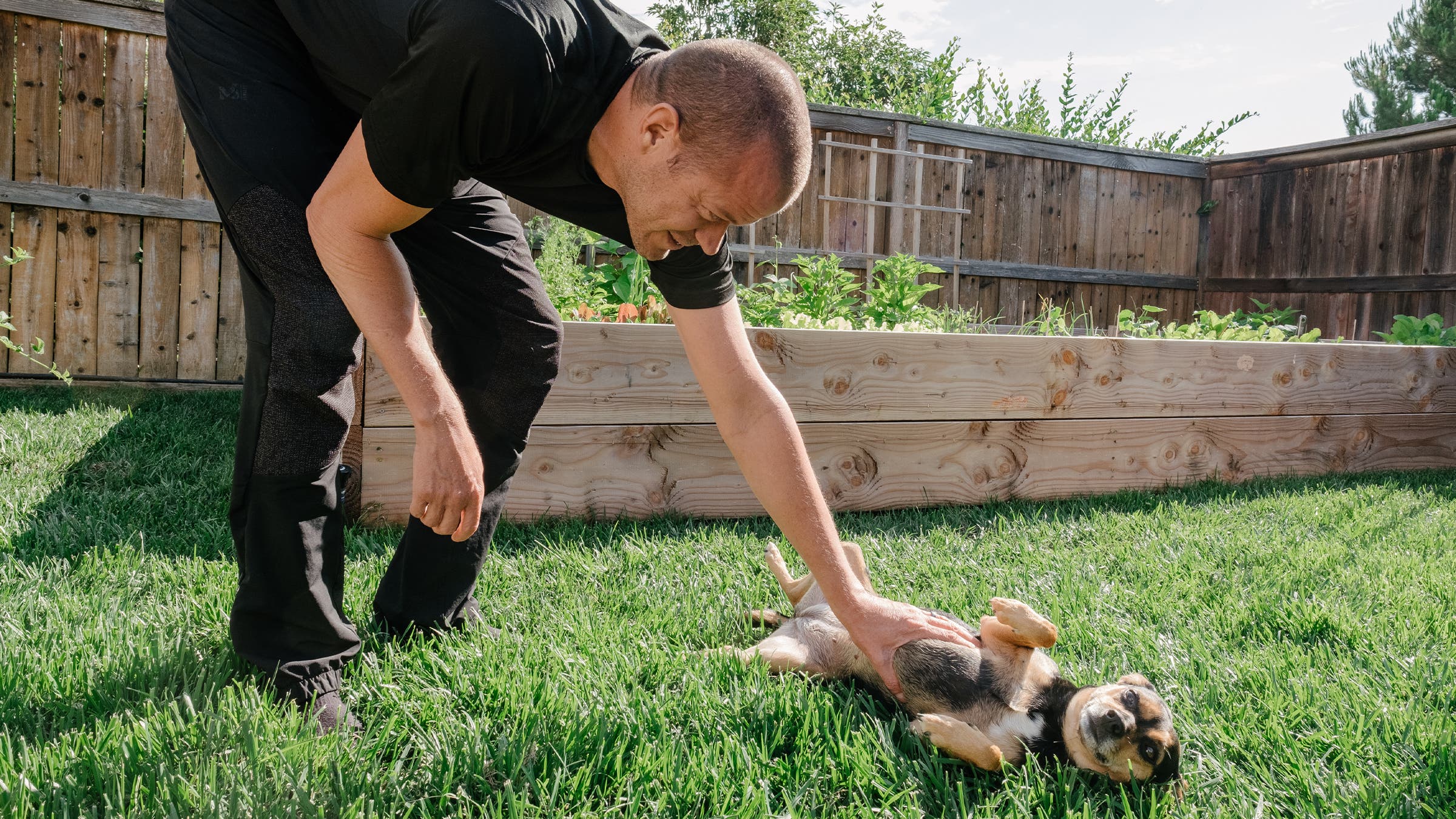 Corliss in his yard with Ziggy