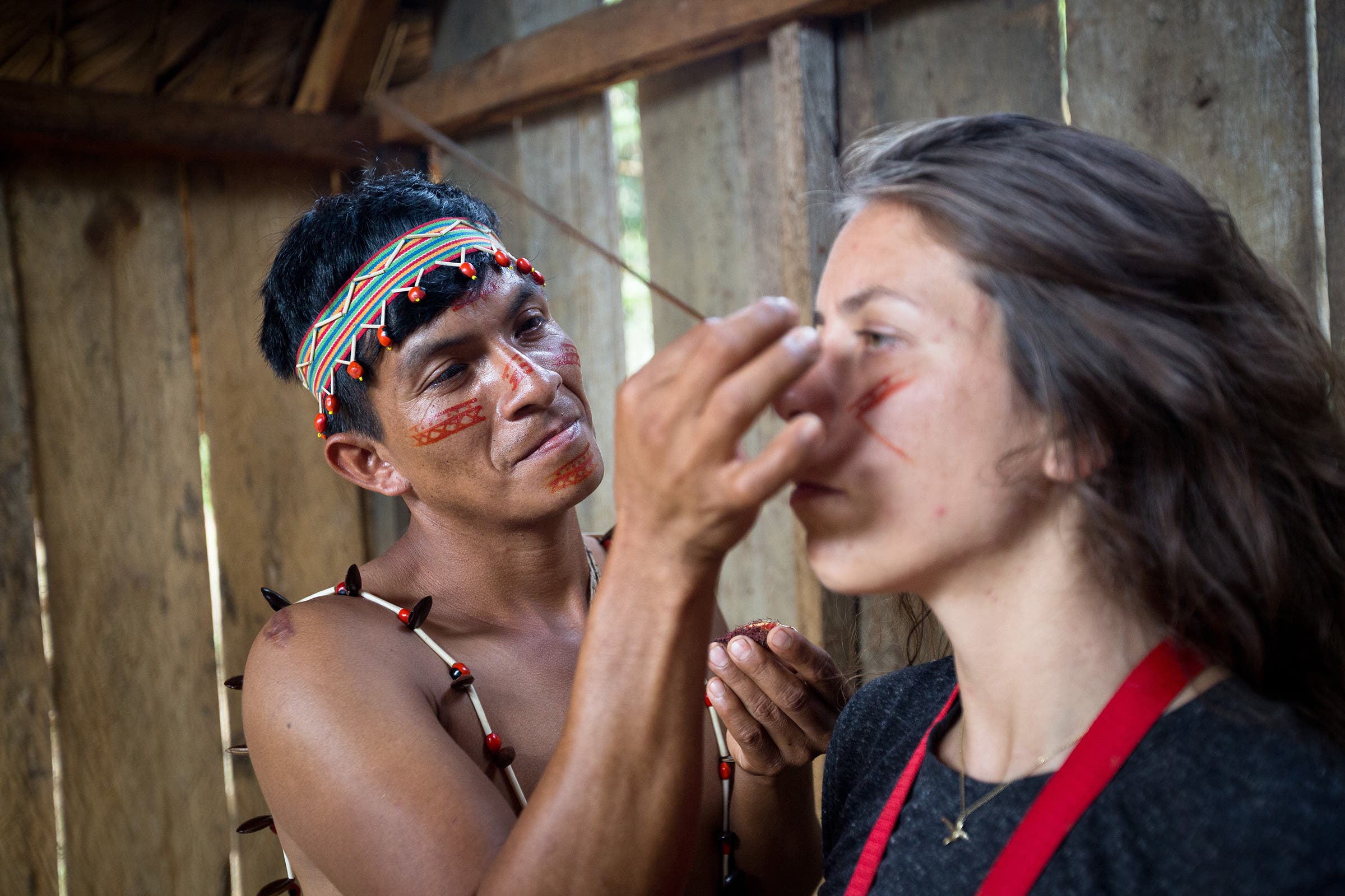 Shuar guide Jaime Tiwiram giving a blessing before leading a group into the cave
