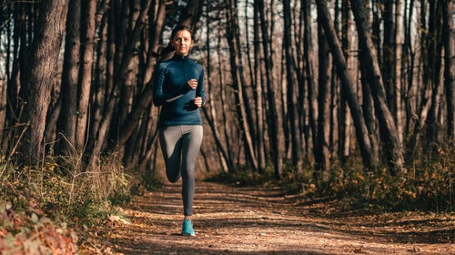 Woman Jogging In The Park