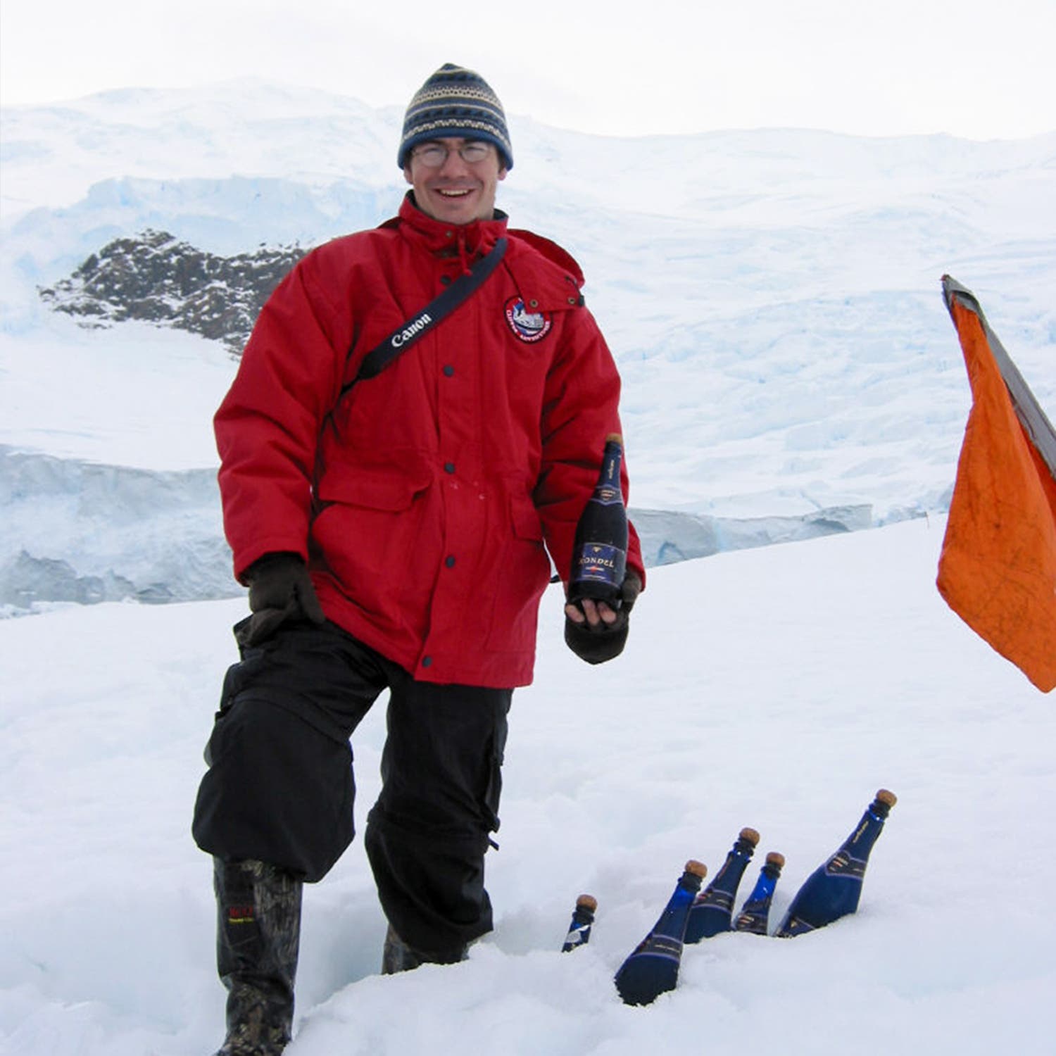 Greeting passengers with champagne as they arrive in Antarctica