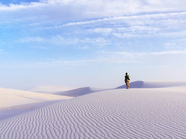 The man at the deserts landscape