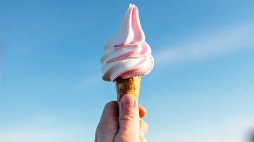 Hand Holding Strawberry Ice Cream