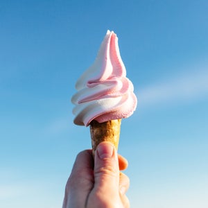 Hand Holding Strawberry Ice Cream