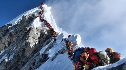 Nirmal Purja’s photo of a line of climbers on Everest’s summit ridge went viral in 2019.