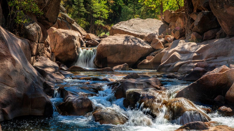 Waterfall on Cascade Highway 7 South Saint Vrain Creek near Rocky Mountain National Park in Autumn