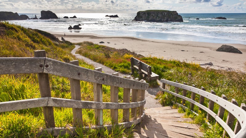 Wooden staircase leading to Bandon Beach, Oregon, USA