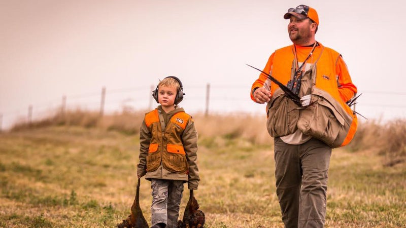 Sal Roseland and his son collecting birds