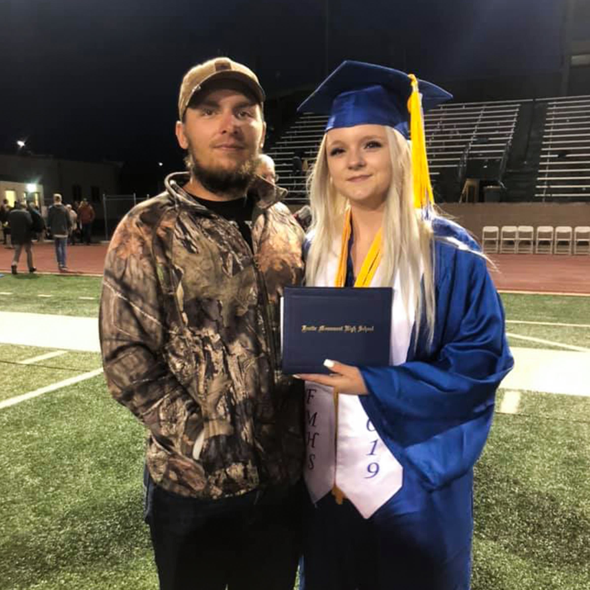 Gage Lorentz with his sister after her graduation in 2019