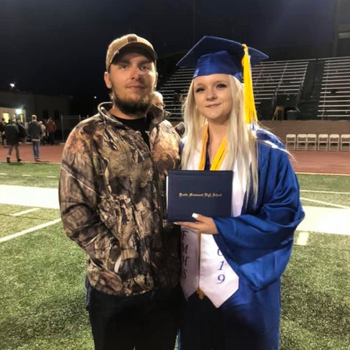 Gage Lorentz with his sister after her graduation in 2019