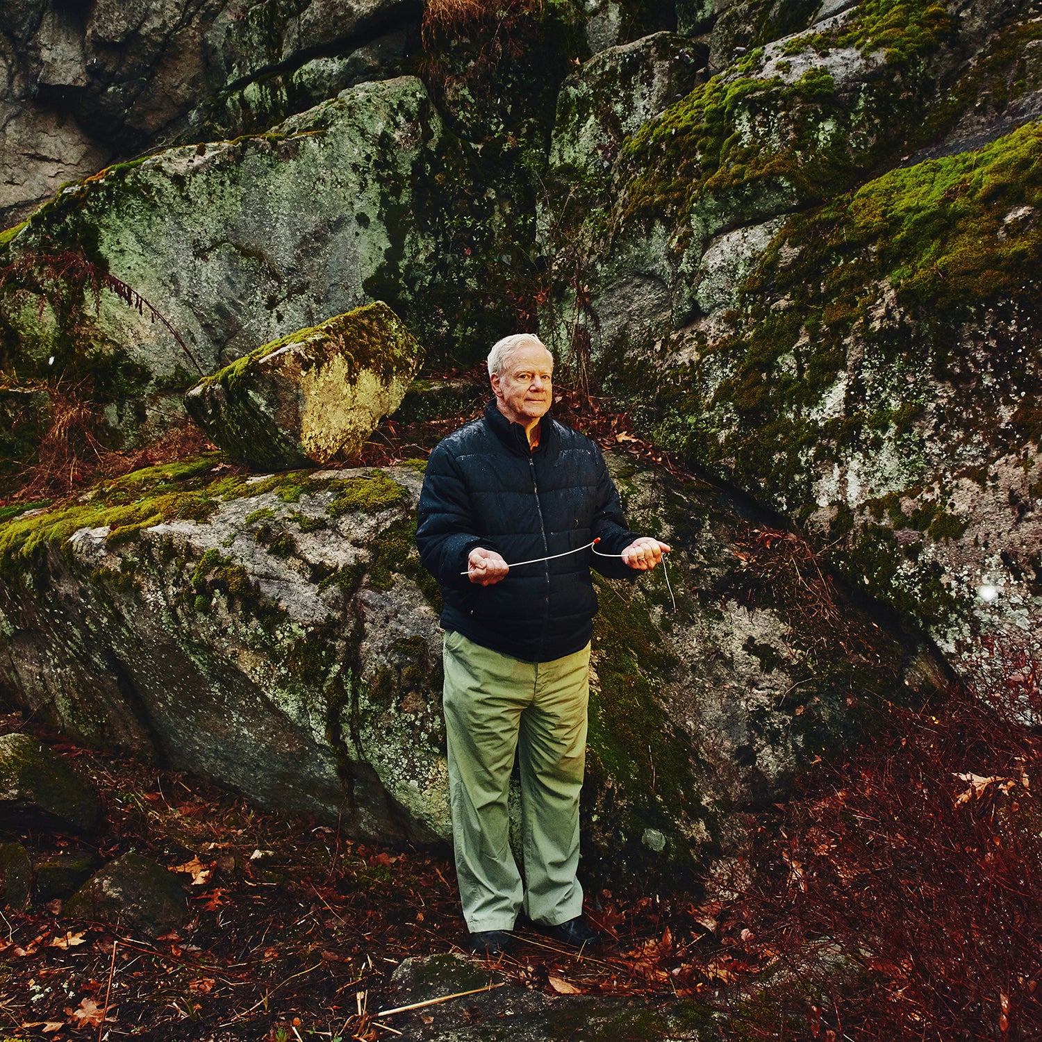 Leroy Bull with a dowsing rod in Stamford, Connecticut