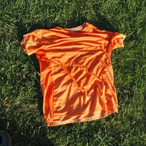 The Hot Shot manages moisture just as well as merino wool and dries just as fast, but has held up to my testing abuse.