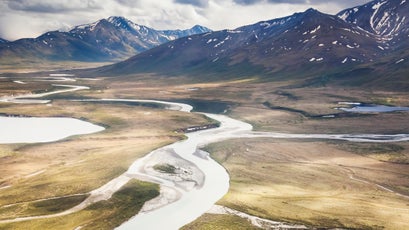 Aerial of the Noatak river flowing north out of the Brooks range, Gates of the Arctic national park, Alaska