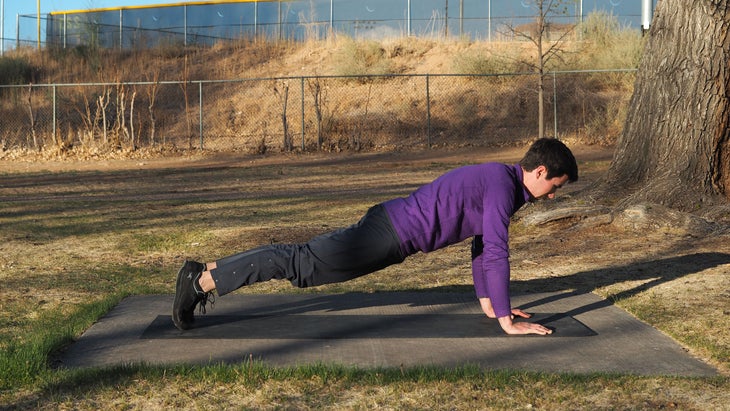 man in high plank