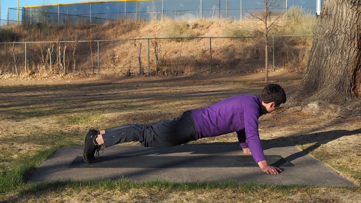 man lowering to stomach