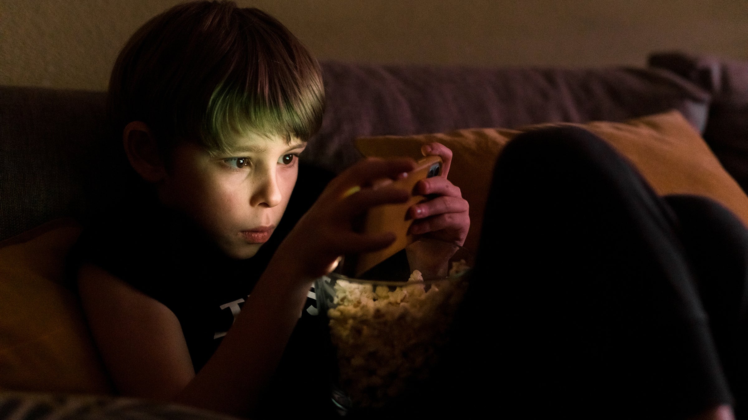 Kid Playing On The Phone