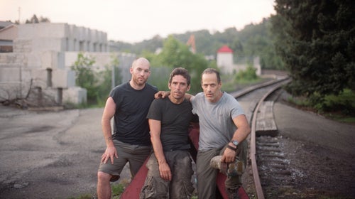 Sebastian Junger, right, with two friends, walking Pennsylvania’s railroad lines